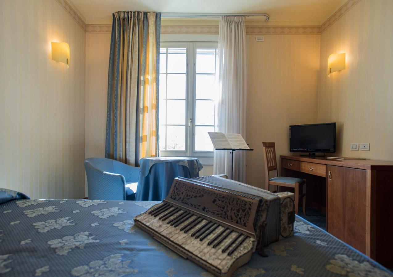 Phi Hotel Astoria Susegana Exteriör bild